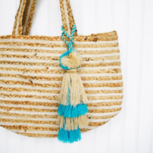 Load image into Gallery viewer, Blue and off white tassel on bag
