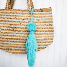 Load image into Gallery viewer, Blue tassel on bag

